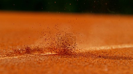 Photo for Close up of Tennis ball ping on clay court inside or outside white line - Royalty Free Image