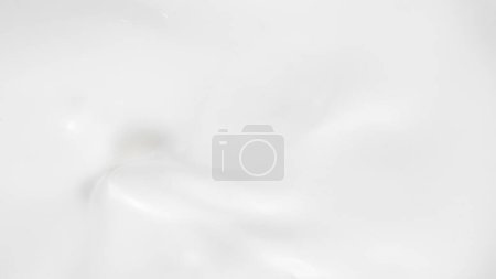 Photo for Freeze motion of whirling milk cream, close-up - Royalty Free Image