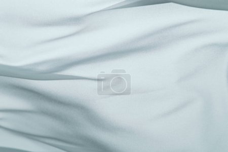 Photo for Closeup of rippled white silk fabric, color fabric draped in soft waves empty bed sheet - Royalty Free Image