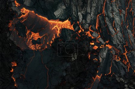 Téléchargez les photos : Vue aérienne de la texture d'un champ de lave solidifiant, gros plan - en image libre de droit