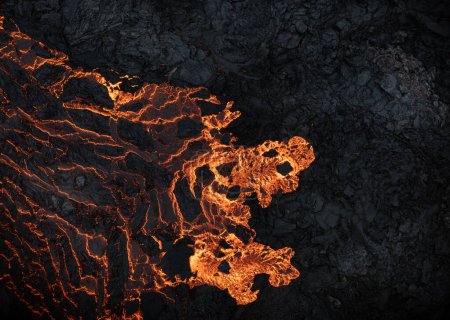 Téléchargez les photos : Vue aérienne de la texture d'un champ de lave solidifiant, gros plan - en image libre de droit