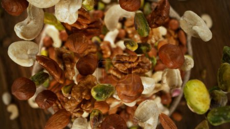 Photo for Falling of various nuts, close-up, wide super macro shot - Royalty Free Image