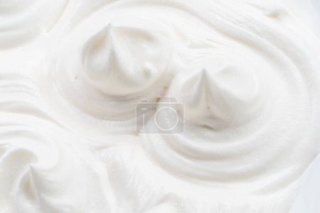 Photo for Pics and waves in yoghurt or cream surface. Top view. - Royalty Free Image