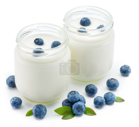 Photo for Two glass containers with plain yoghurt and berries isolated on white background. - Royalty Free Image