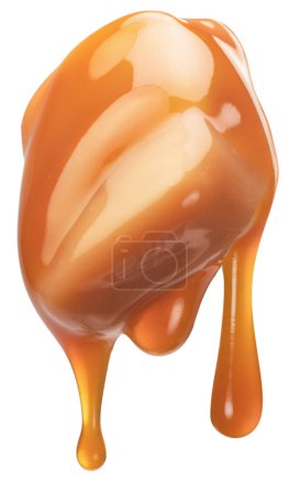 Foto de Caramel candy and drops of milk caramel sauce flowing down from it. File contains clipping path. - Imagen libre de derechos