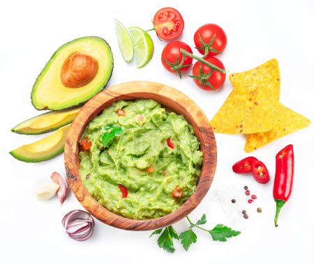 Photo for Guacamole and guacamole ingredients isolated on white background.  Flat lay. - Royalty Free Image