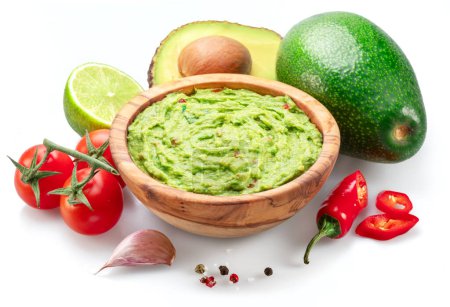Photo for Guacamole bowl and guacamole ingredients isolated on white background. - Royalty Free Image
