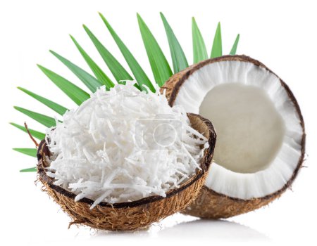 Photo for Cracked coconut and shredded coconut meat isolated on white background. - Royalty Free Image