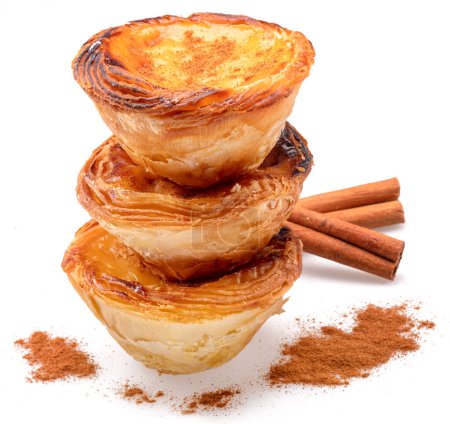 Photo for Pastel de nata tarts and cinnamon sticks isolated on white background. - Royalty Free Image