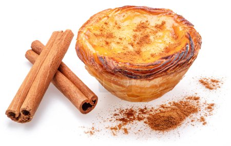 Photo for Pastel de nata tart and cinnamon sticks isolated on white background. - Royalty Free Image