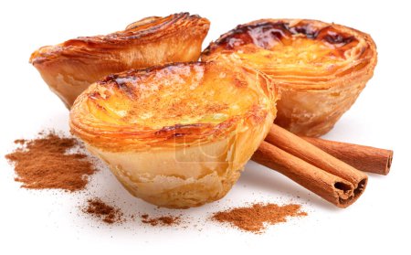 Photo for Pastel de nata tarts and cinnamon sticks isolated on white background. - Royalty Free Image
