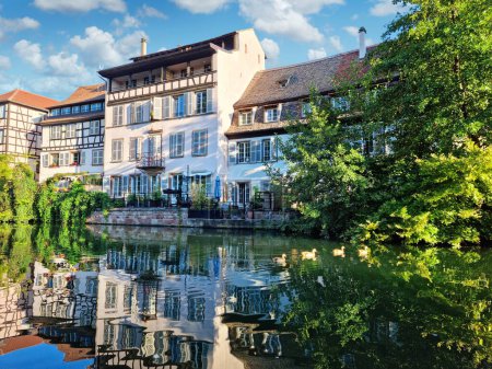 Photo for Le Petite France, the most picturesque district of old Strasbourg. Half-timbered houses with reflection in waters of the Ill channels. - Royalty Free Image