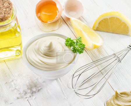 Photo for Homemade mayonnaise with ingredients and herbs. - Royalty Free Image