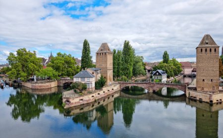 Photo for Panoramic view on The Ponts Couverts in Strasbourg with blue cloudy sky. France. - Royalty Free Image