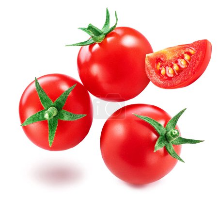 Red cherry tomatoes on branch with water drops isolated on white background.