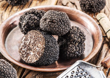 Photo for Summer truffles and truffle slices isolated on white background. Close-up. - Royalty Free Image