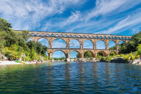 Photo for The Pont du Gard is an ancient Roman aqueduct, that is depicted  on five euro note. Summer 2022. - Royalty Free Image