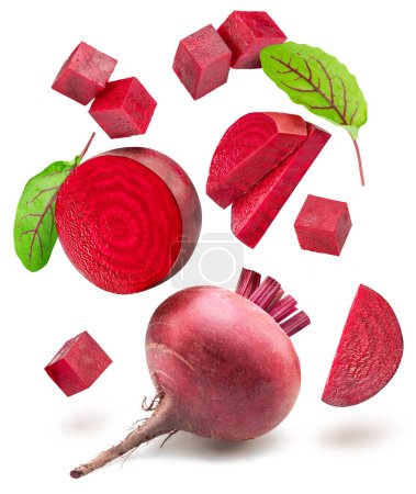 Red beetroot and beetroot slices levitating in air on white background. 