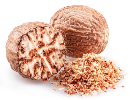 Nutmeg and ground nutmeg heap isolated on white background. 