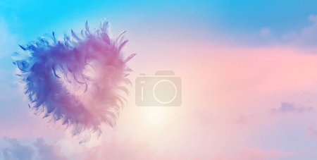 Foto de Beautiful heart of an angel in the morning sky. abstract background for valentine's day banner - Imagen libre de derechos