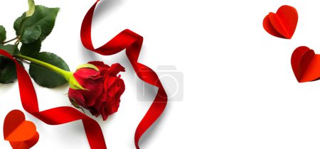 Foto de Banner Design elements for Valentine's Day background. Red rose flower, Decoration Red Heart and ribbon on a white background, flat lay - Imagen libre de derechos