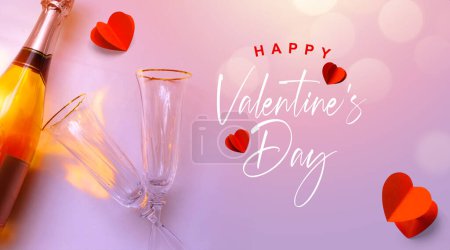 Téléchargez les photos : Greeting banner or card happy valentine's day. Champagne wine and two glasses of wine on a romantic pink background. - en image libre de droit