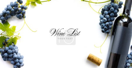 Foto de Wine list or wine card design background; sweet black grapes and red wine bottl - Imagen libre de derechos