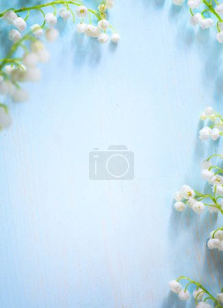 Photo for Spring flower border on blue background; white spring blossom border; copy spac - Royalty Free Image