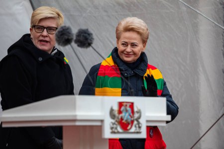 Photo for Vilnius, Lithuania - February 16, 2023: Prime minister Ingrida Simonyte and former president Dalia Grybauskaite during the State Restoration Day of Lithuania. - Royalty Free Image