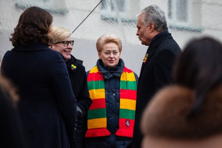 Photo for Vilnius, Lithuania - February 16, 2023: President Gitanas Nauseda, prime minister Ingrida Simonyte, former president Dalia Grybauskaite during the State Restoration Day of Lithuania. - Royalty Free Image