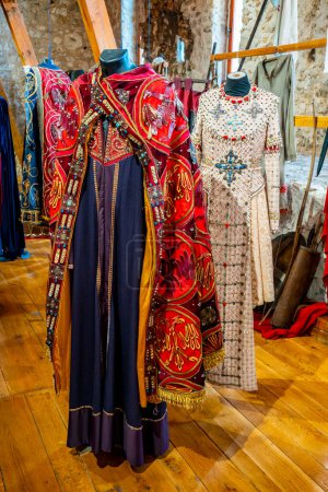 Photo for Golubac, Serbia - September 1, 2021: Traditional Serbian medieval costumes on exibition Nemanjici - Born of the Kingdom by author Petar Djinovic. Nemanjic was the most important dynasty of Serbia in the Middle Ages - Royalty Free Image