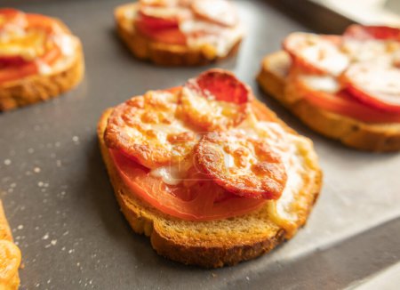 Delicious Toast with Tomato, Salami, and Cheese Close Up