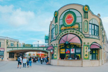 Photo for Vienna, Austria - August 28, 2022: People at the entrance to famous Wurstelprater amusement park, also known as simply Prater, that opened in 1766 in Vienna, Austria - Royalty Free Image