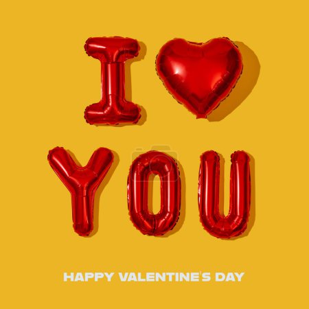 Téléchargez les photos : Text happy valentines day and some letter-shaped balloons forming the sentence I love you on a yellow background, on a square format - en image libre de droit