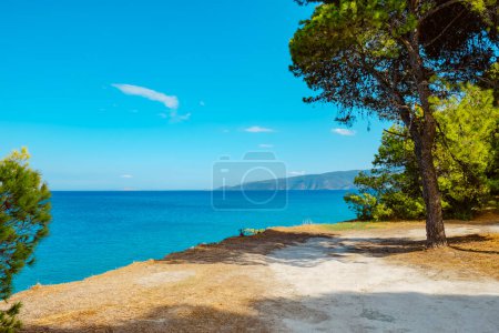 Téléchargez les photos : A view over the Aegean sea, as seen from a natural landscape on the coast in Isthmia, Greece - en image libre de droit