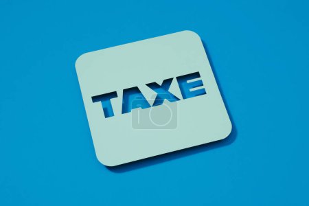 Photo for The text tax written in french in a pale blue sign, on a blue background - Royalty Free Image