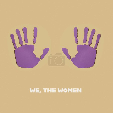 Photo for Two violet hands and the text we the women on a pale brown background - Royalty Free Image