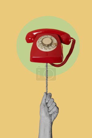 Photo for A man hand in black and white pulling a rope with a red rotary dial telephone in its end, in a green circle, on a yellow background - Royalty Free Image
