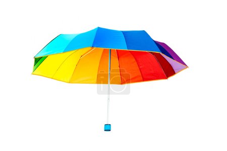 Photo for An umbrella patterned with the colors of the rainbow flag on a white background - Royalty Free Image