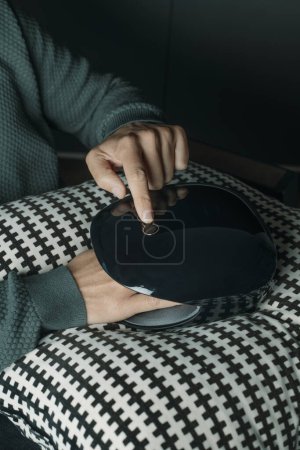Photo for Caucasian man using a hand massager - Royalty Free Image