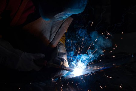 view of welder in action, France