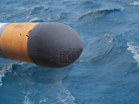 Photo for Torpedo underwater ranged weapon self propelled towards a target with explosive warhead - Royalty Free Image