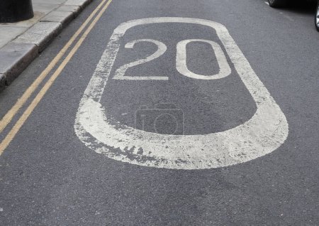 twenty miles per hour speed limit sign zone in the city centre