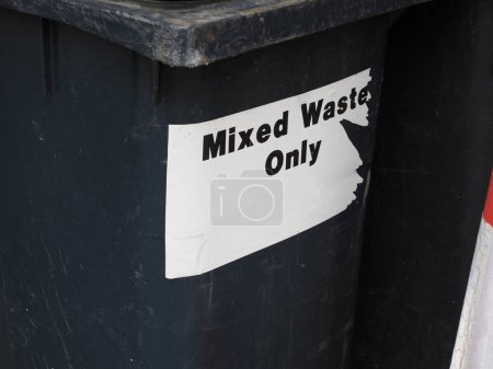 mixed waste only sign on a garbage bin
