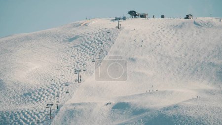 Alpine skiing slope and ski lift