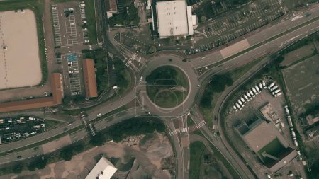Aerial top down shot of roundabout traffic