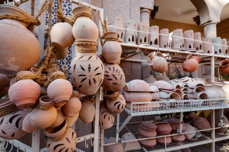 Photo for Hand Made Pottery in Nizwa Market. Clay Jars at the Rural Traditional Arabic Bazaar, Oman. - Royalty Free Image