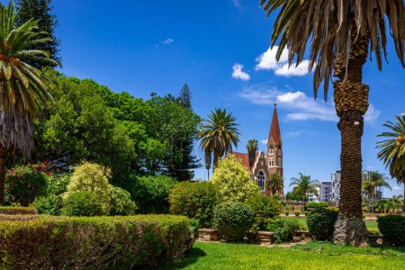 Photo for Green Botanical Parliament Gardens in Windhoek, Namibia. Christus Kirche, or Christ Church. Windhoek, Namibia. Africa. - Royalty Free Image