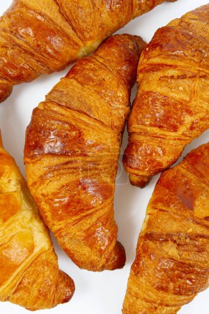 Photo for Fresh tasty croissants isolated on white background,top view - Royalty Free Image
