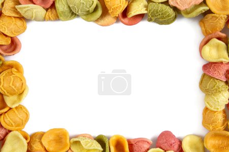 Photo for Coloured raw pasta isolated on white background - Royalty Free Image